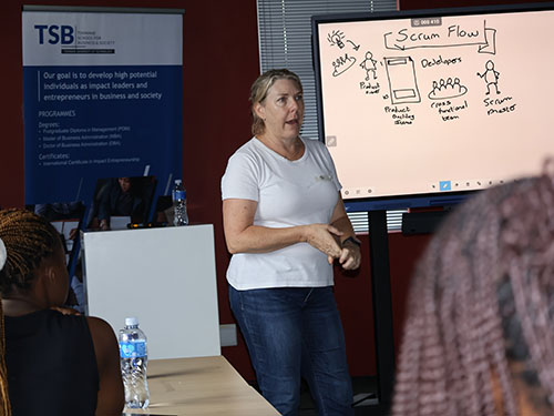 Facilitator taking the interns through