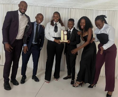 Acting Head of Department for Student Governance and Leadership Development, Thabiso Mbewe (far left), with award recipients during the awards ceremony. SGLD-awards